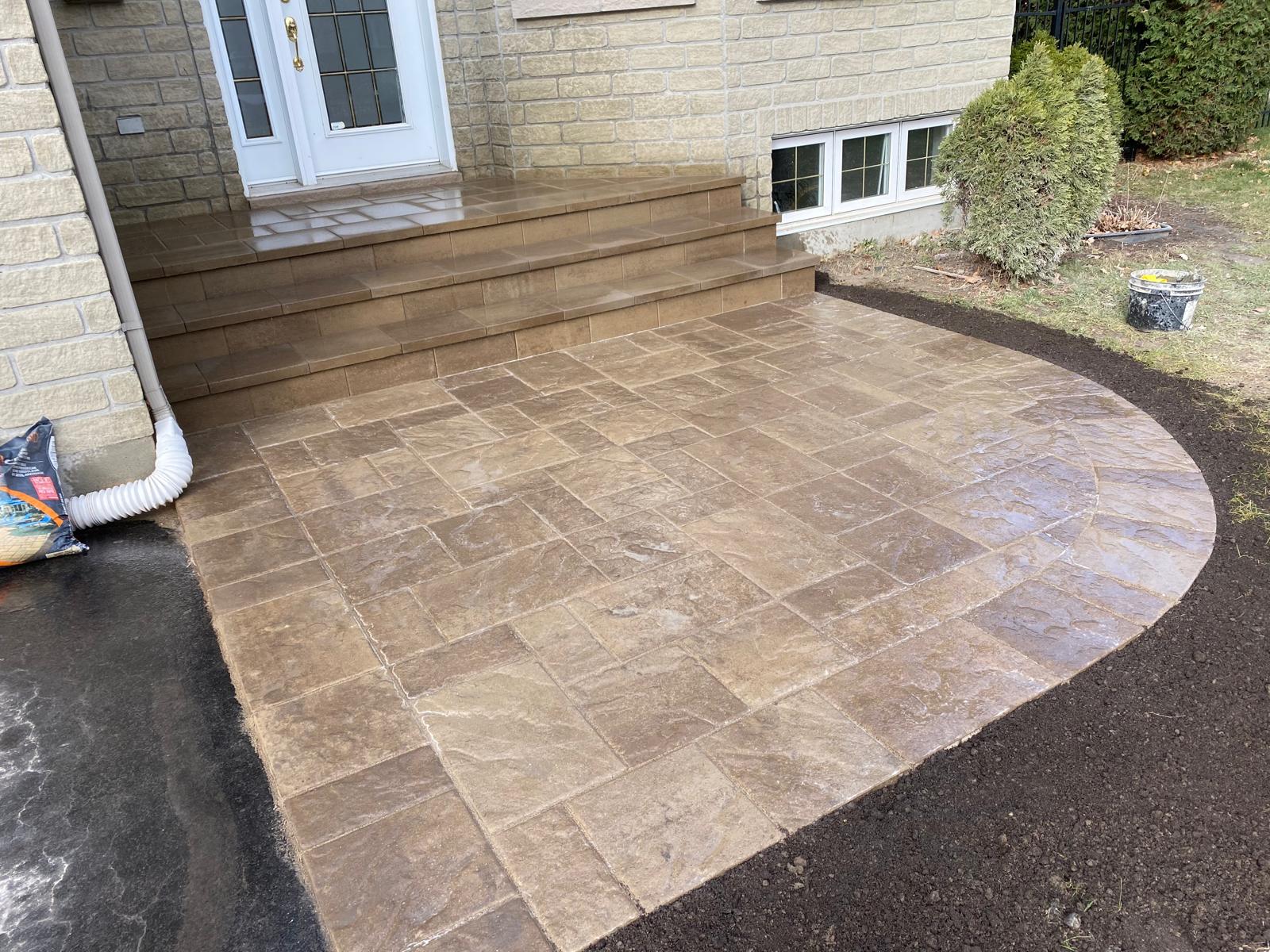 Curved front entrance patio and steps
